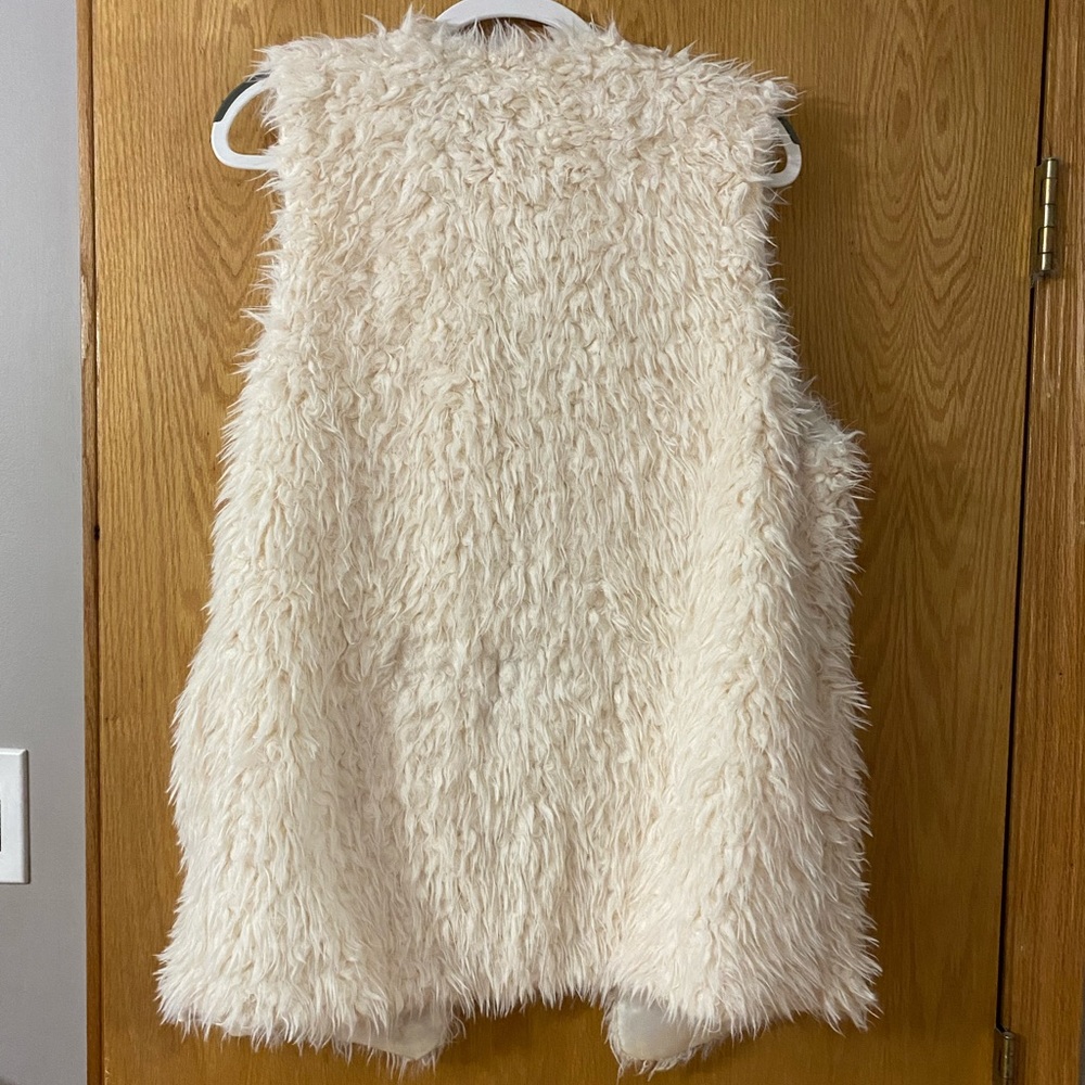 Fuzzy white vest size medium